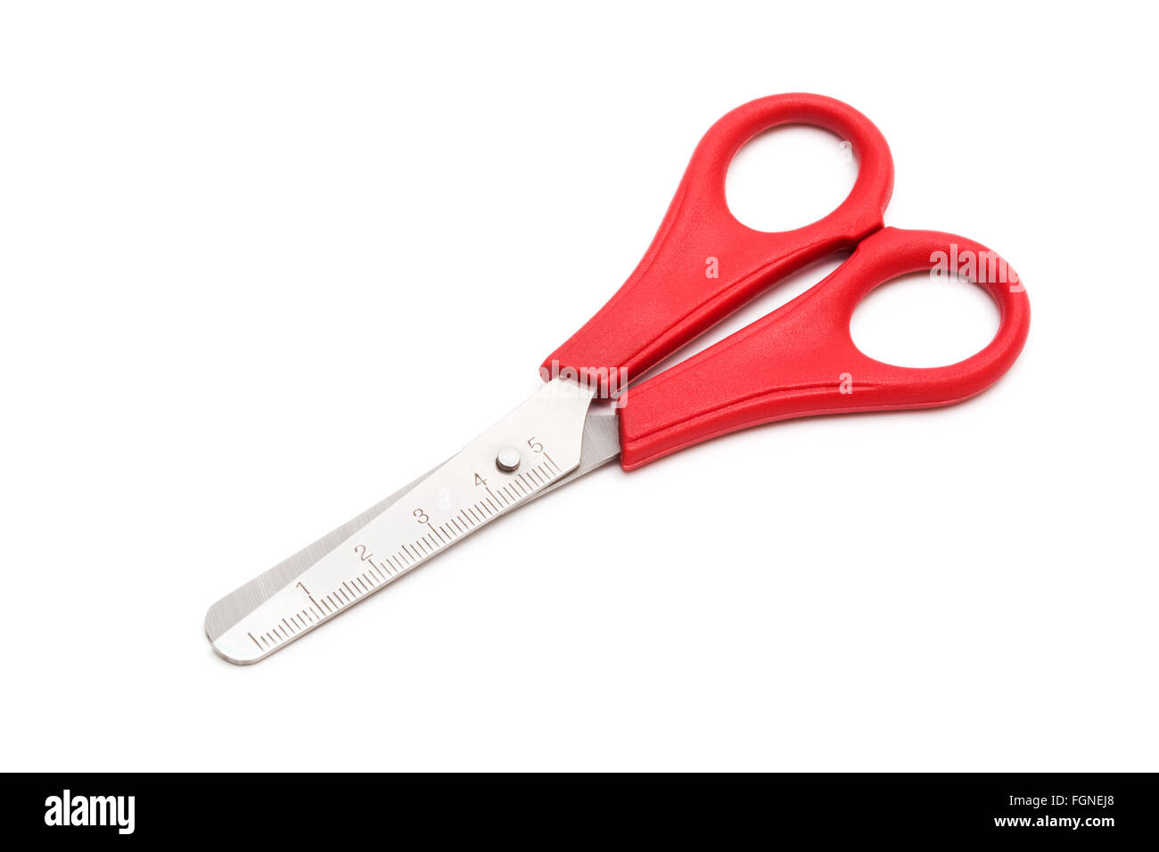 red scissors with a ruler on a white background Stock Photo - Alamy