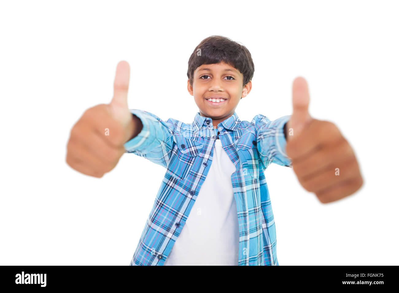 Cute boy showing thumbs up Stock Photo - Alamy