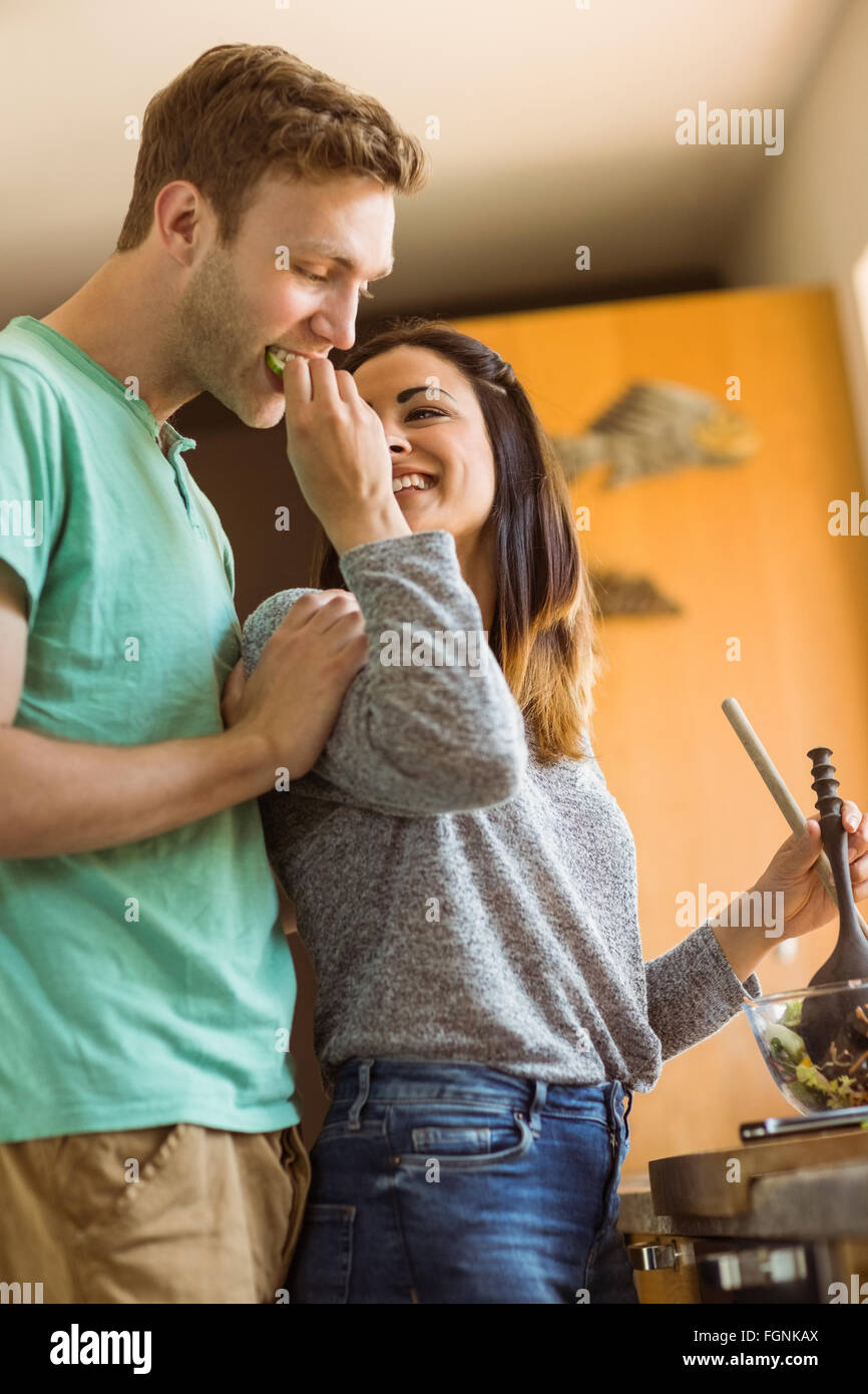 Cute couple making a salad Stock Photo