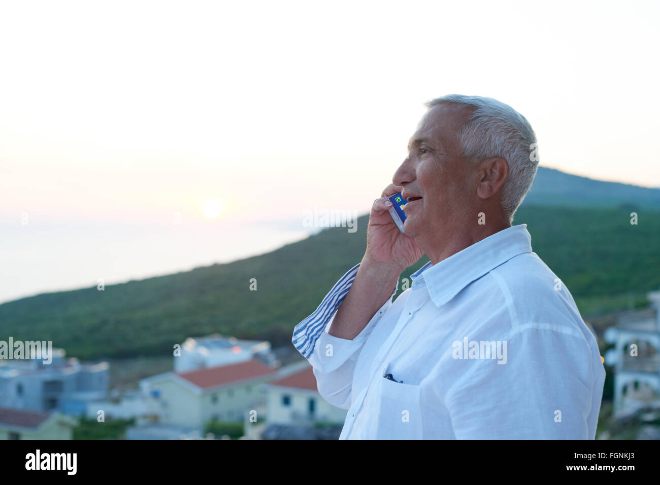 senior man using smart phone Stock Photo - Alamy