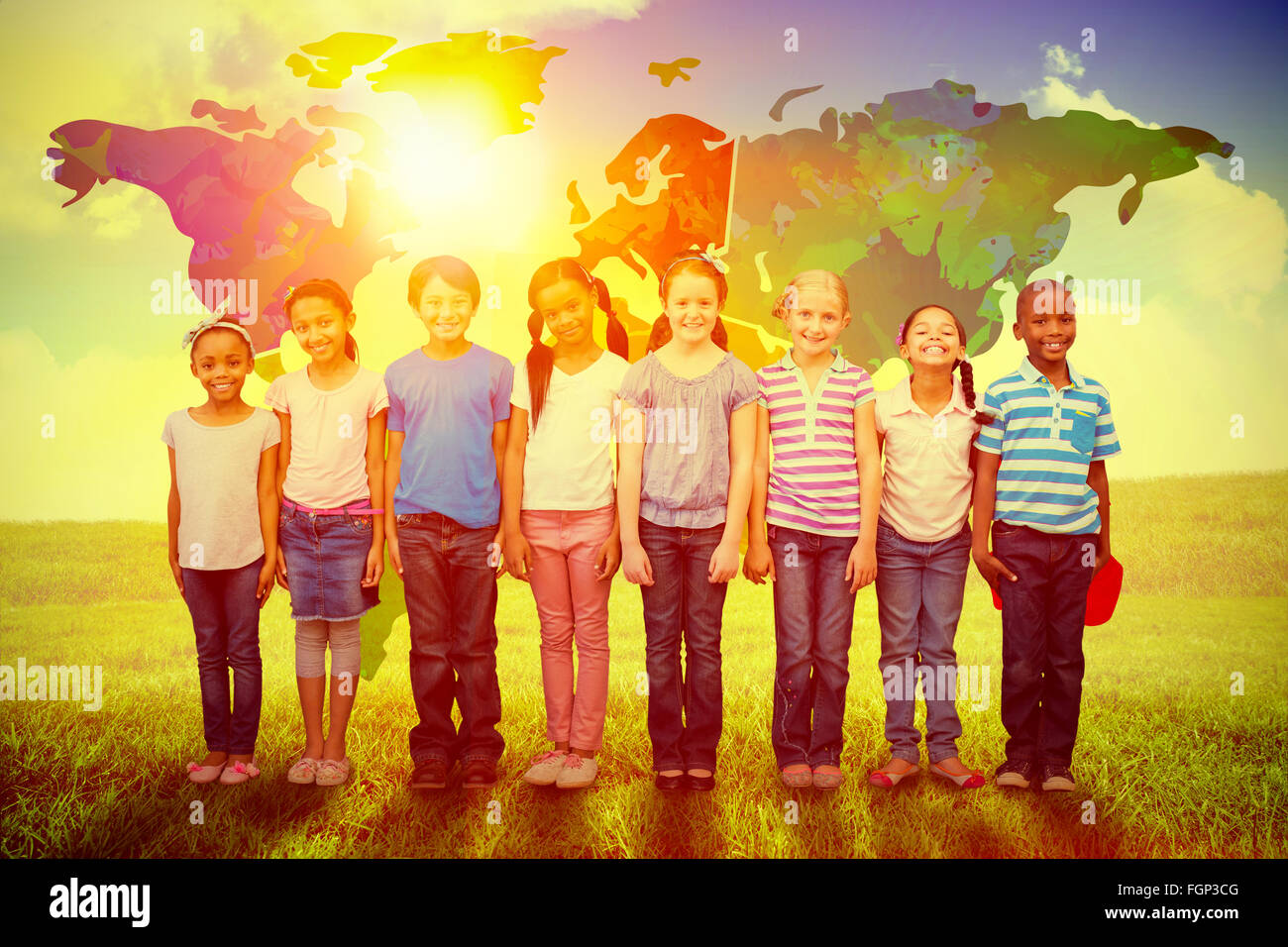 Composite image of cute pupils smiling at camera in classroom Stock ...