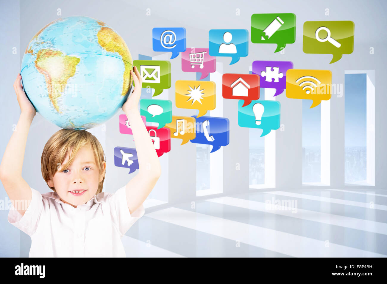 Composite image of cute pupil holding globe Stock Photo - Alamy