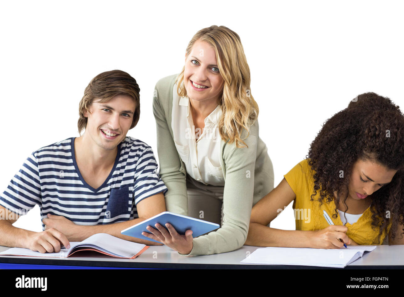 Teacher helping young student tablet hi-res stock photography and ...