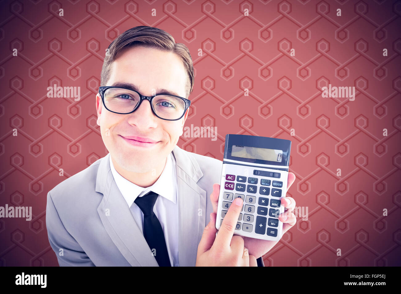 Composite image of geeky smiling businessman showing calculator Stock ...