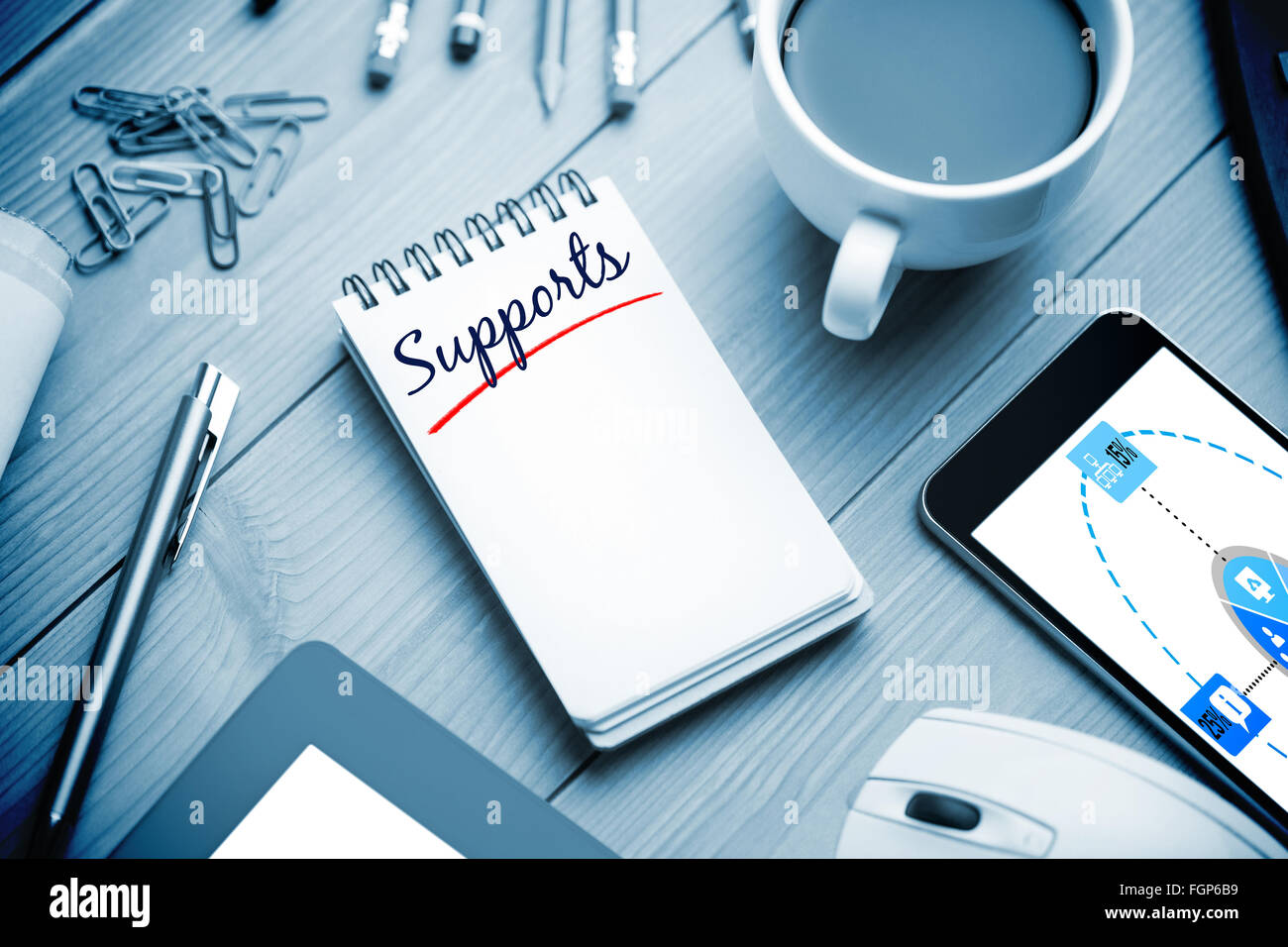 Technical Support Notepad Supports against notepad on desk Stock Photo - Alamy