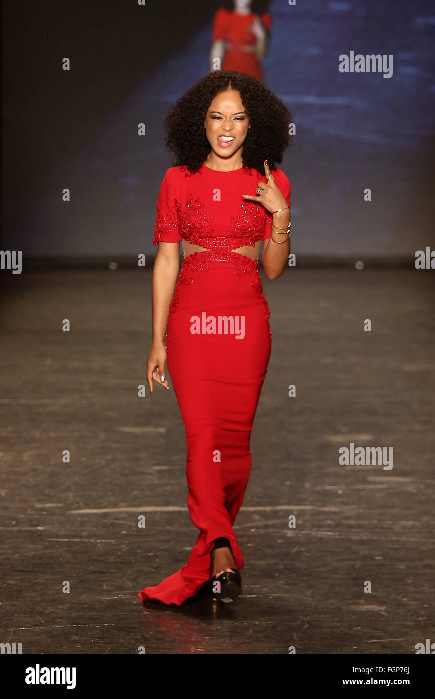 Serayah wears Reem Acra at Go Red for Women Red Dress Collection 2016 Presented by Macy's at New York Fashion Week. Stock Photo
