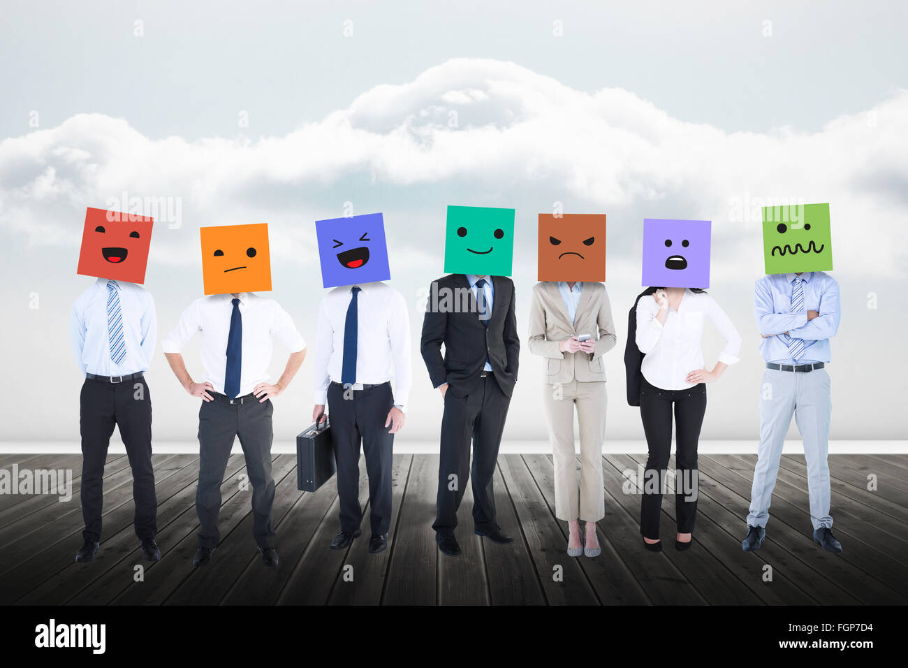 Composite image of people with boxes on their heads Stock Photo - Alamy