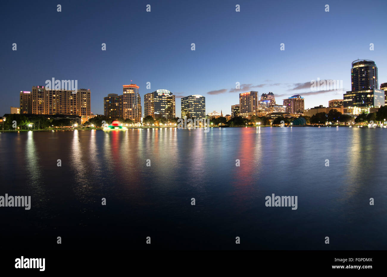 Orlando Florida Lake Eola skyline twilight night colored lights statue