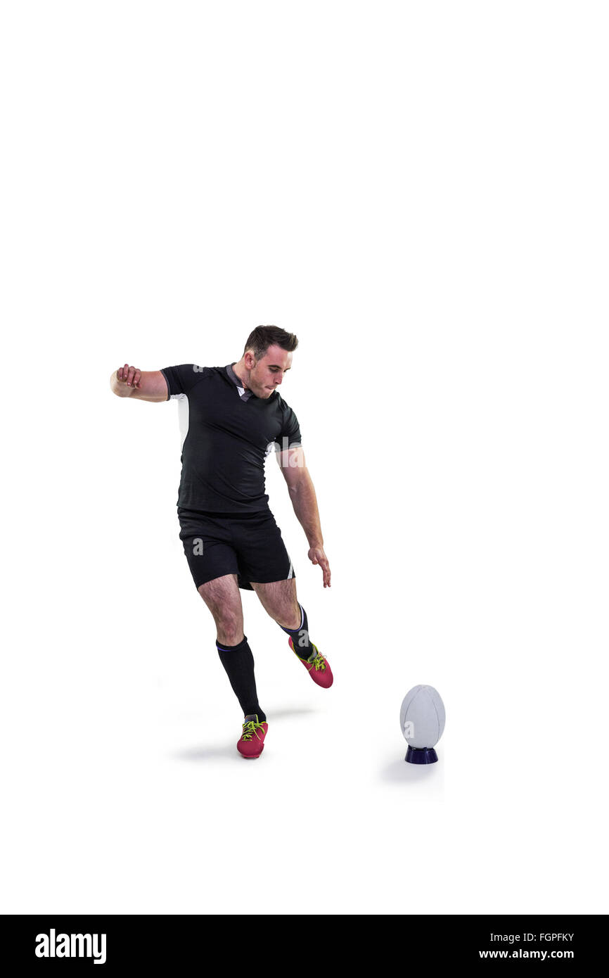 Rugby player kicking the ball Stock Photo Alamy