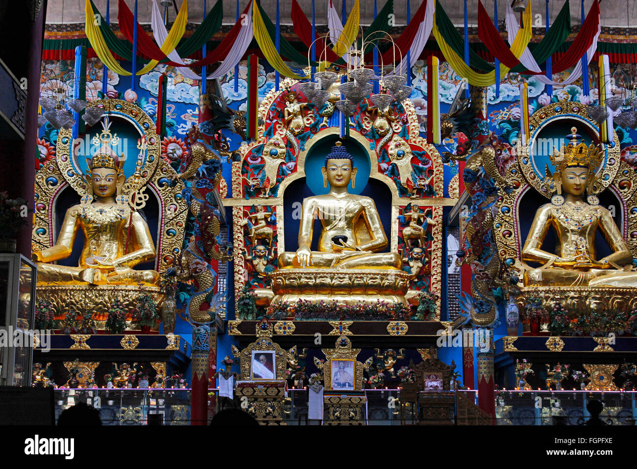Golden statues of Guru Padmasambhava, Buddha Shakyamuni and Amitayus. Buddhist Golden Temple, Bylakuppe, Coorg, Karnataka, India Stock Photo