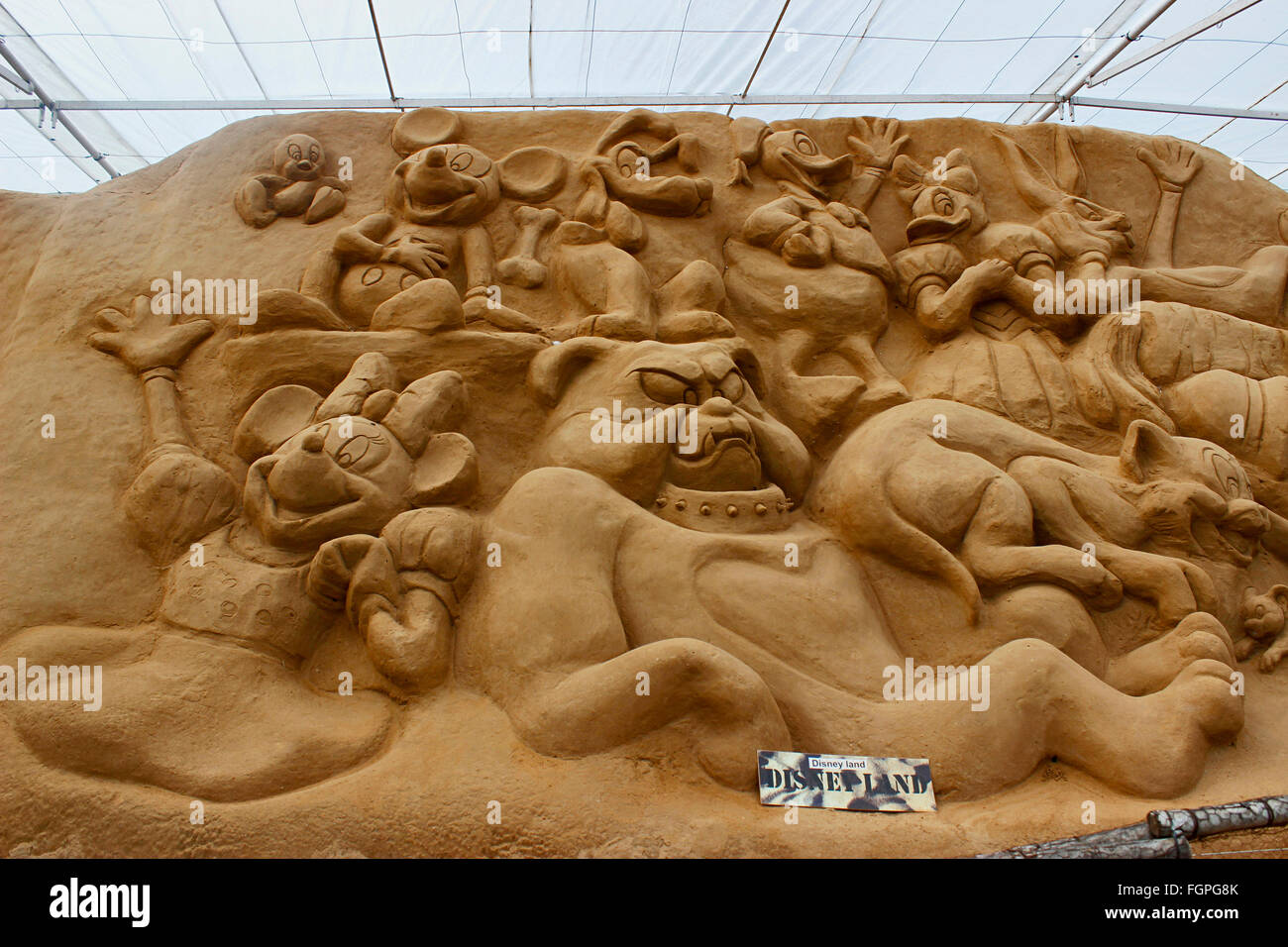 Sand art sculpture depicting disney characters of Disney Land at Sand ...