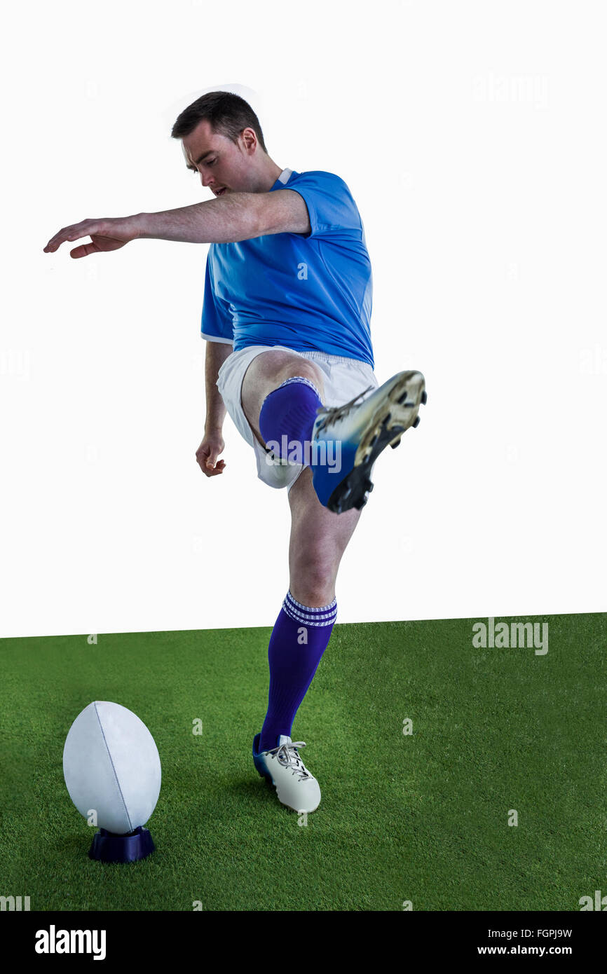 Rugby player doing a drop kick Stock Photo Alamy