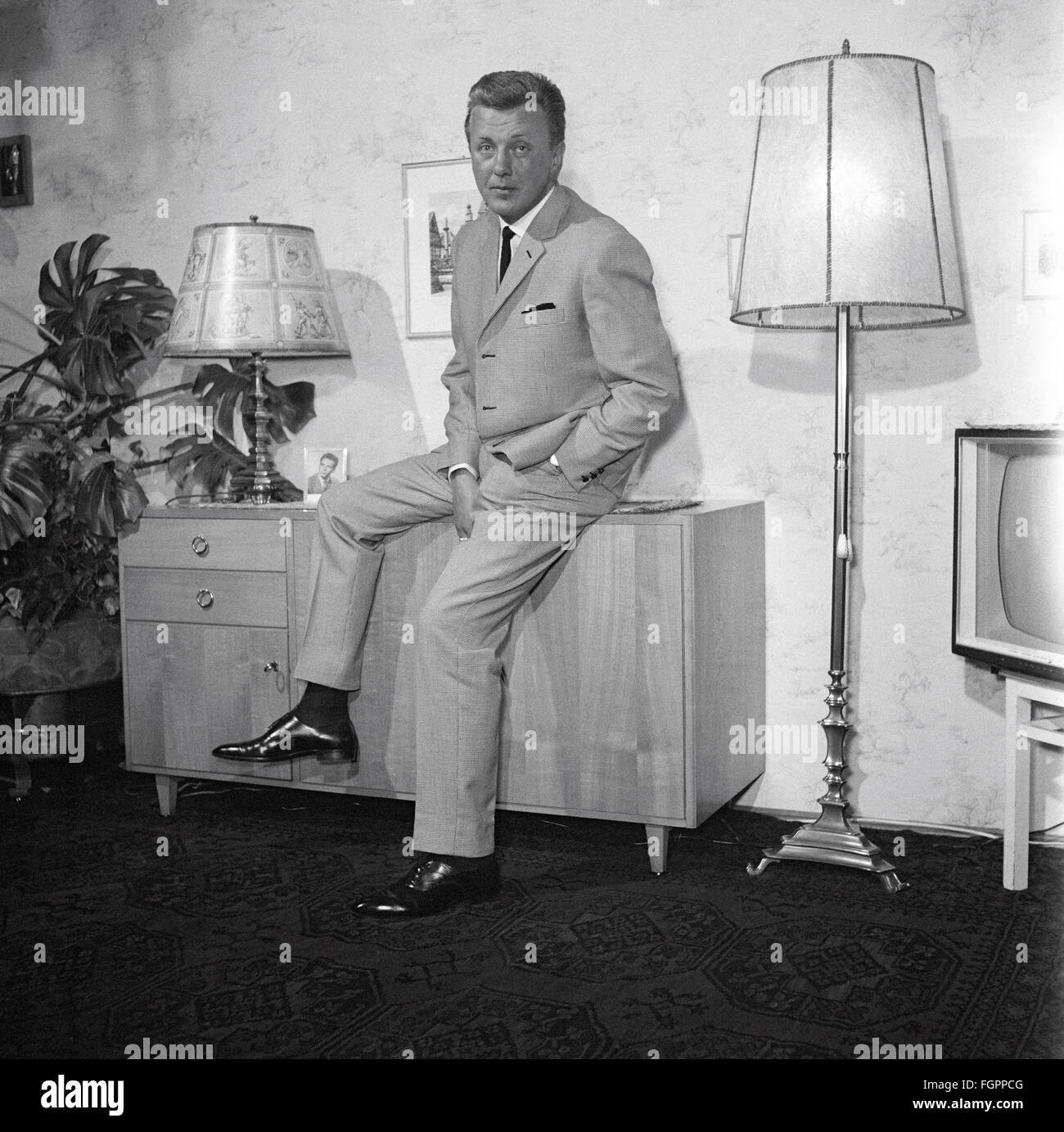 furnishings, living-room, man sitting on commode, 1950s, , Additional-Rights-Clearences-Not Available Stock Photo