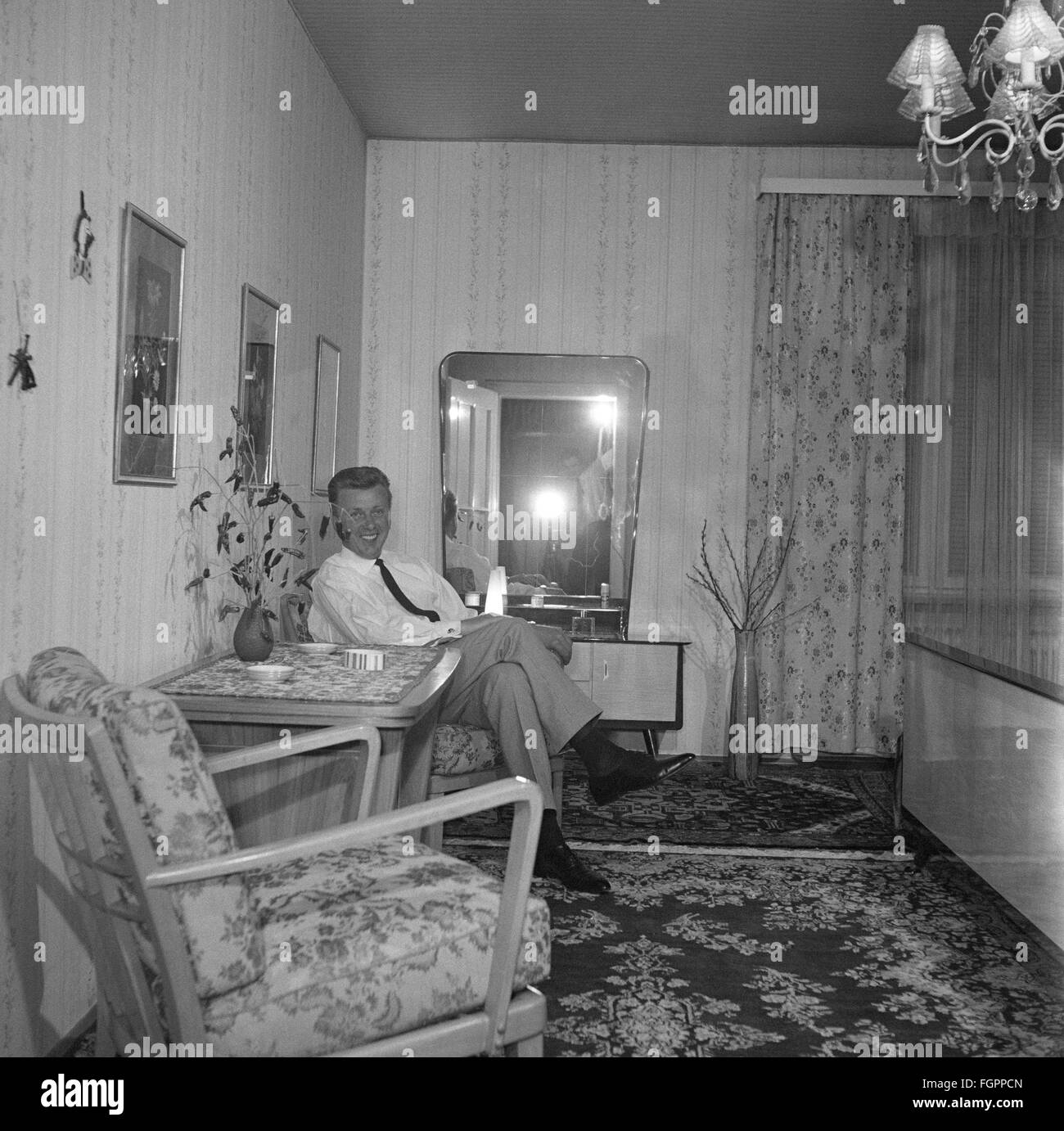 furnishings, living-room, man sitting on armchair, 1950s, , Additional-Rights-Clearences-Not Available Stock Photo