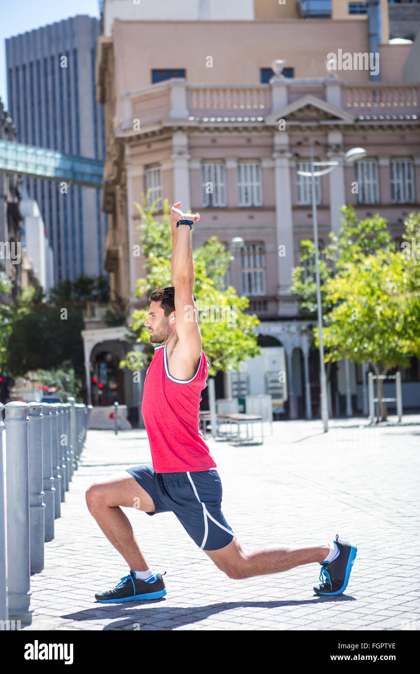 Man stretching leg stopwatch hi-res stock photography and images - Alamy