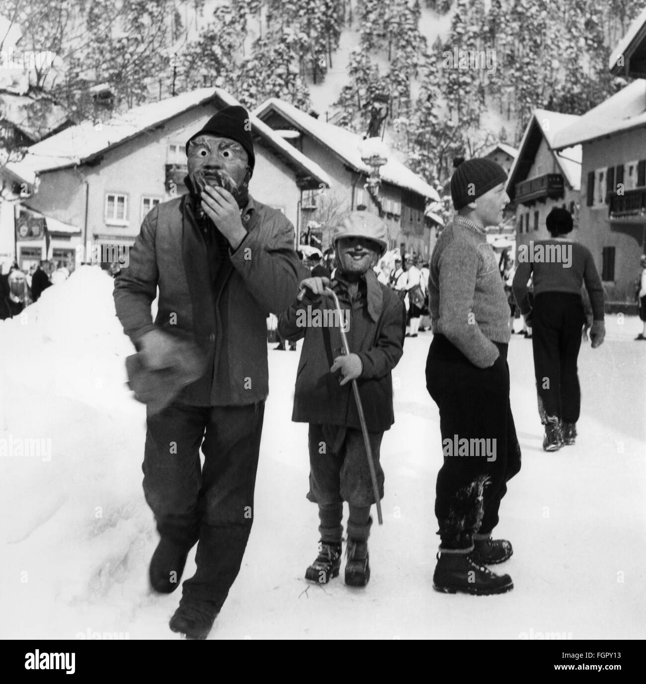 festivities, carnival at Partenkirchen, children with wooden masks Garmisch - Partenkirchen, 1956, Additional-Rights-Clearences-Not Available Stock Photo