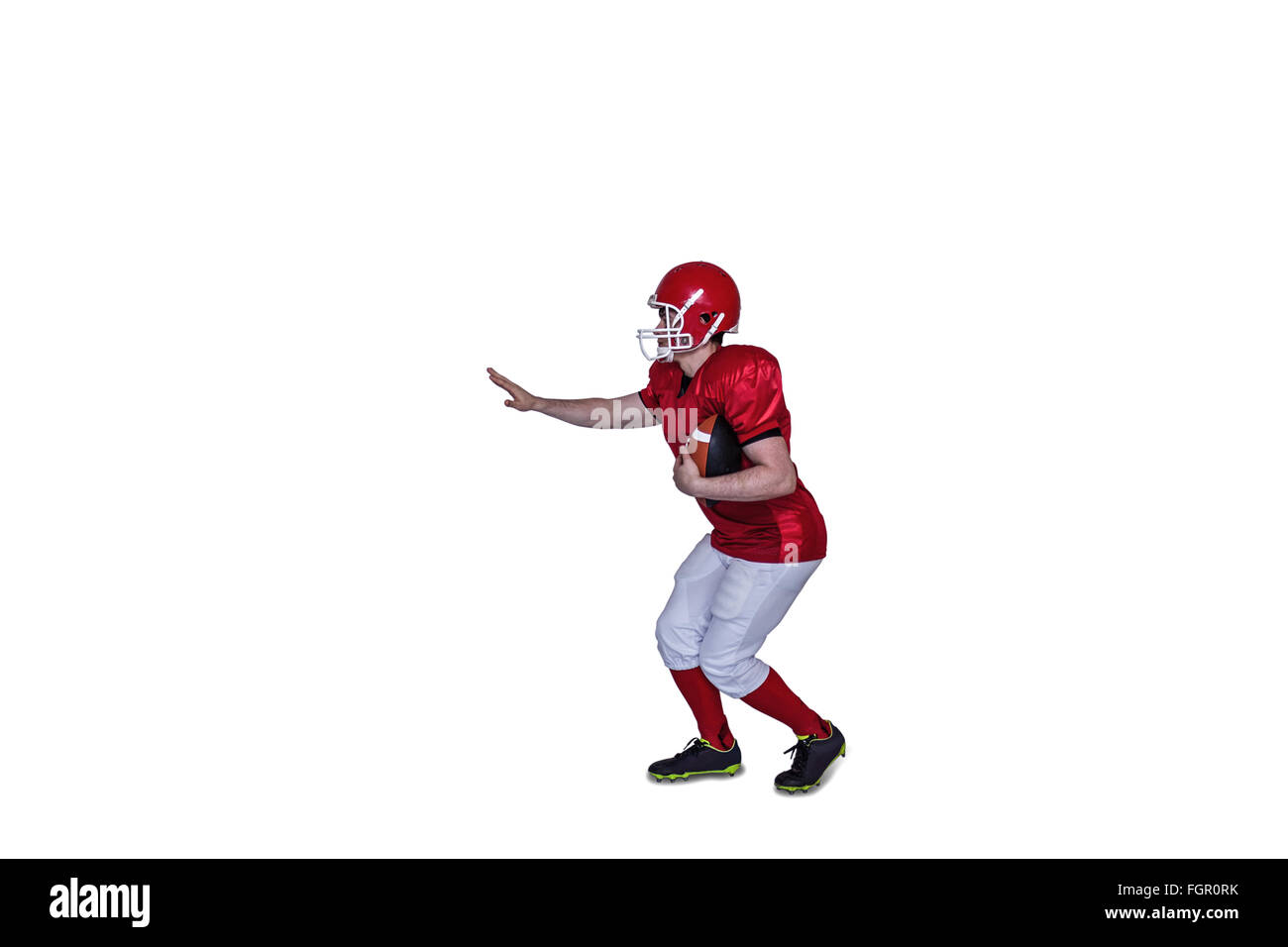 American football player running with the ball Stock Photo