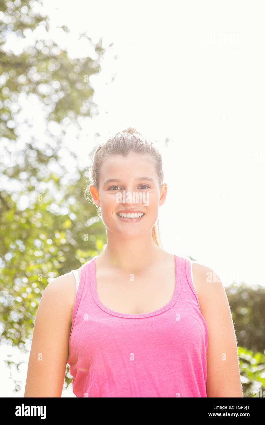 Smiling blonde athlete looking at camera Stock Photo - Alamy