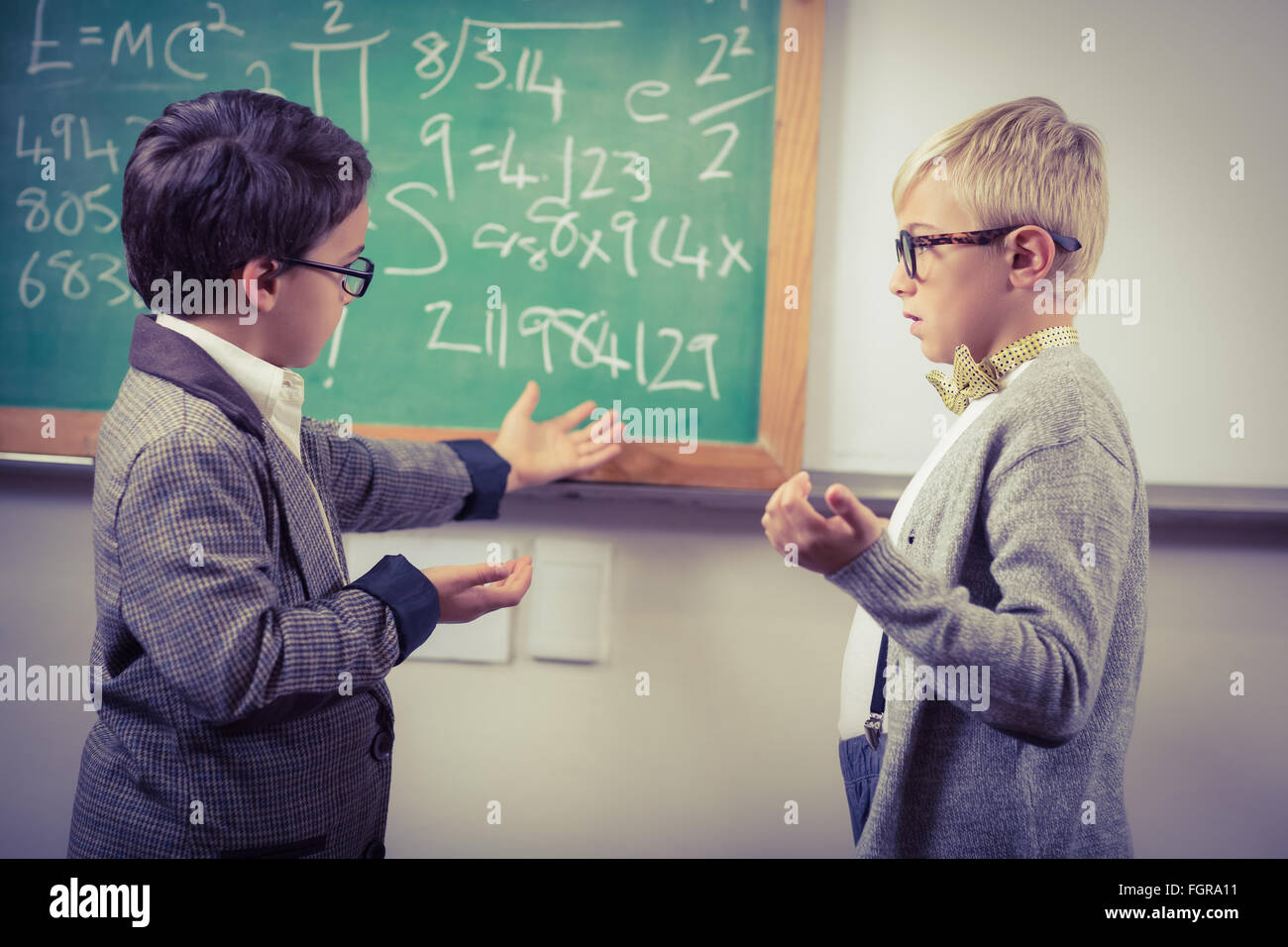 Student Pretending Not To Listen To His Teacher Standing Near Him Stock  Image - Image of classroom, discussion: 139587523