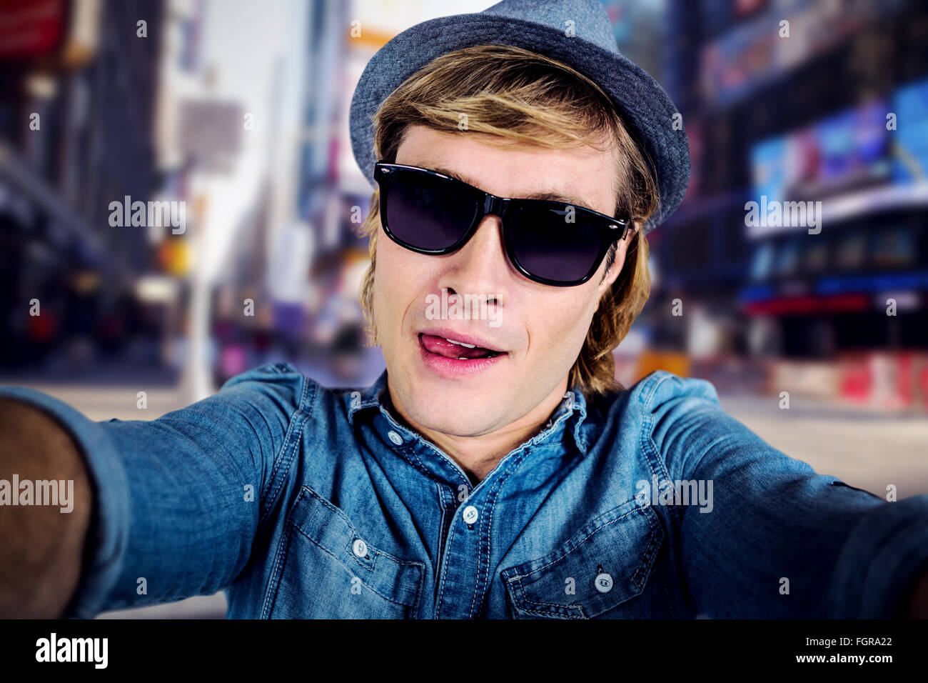 Composite image of crazy hipster wearing sunglasses Stock Photo