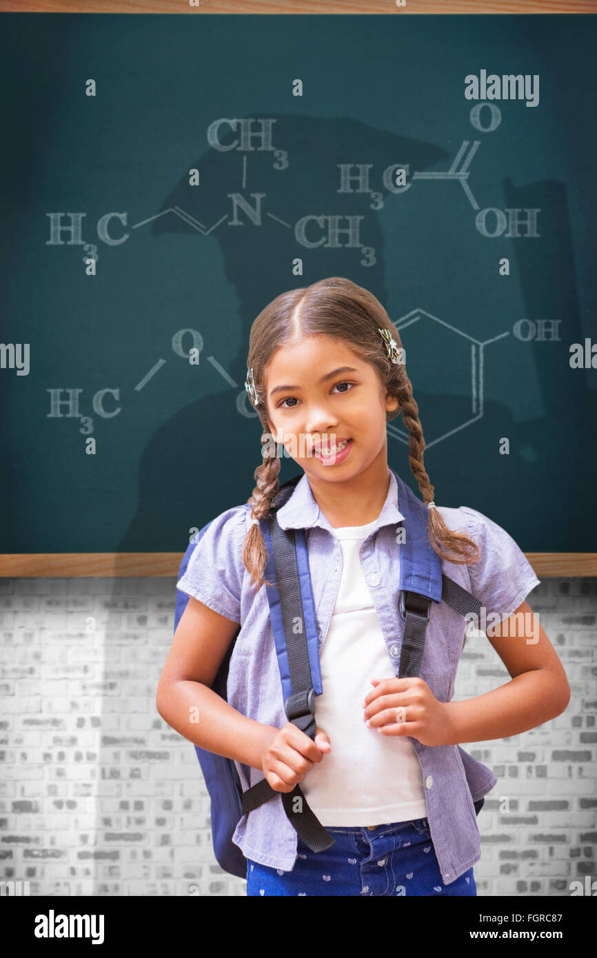 Composite image of cute pupil smiling at camera Stock Photo - Alamy