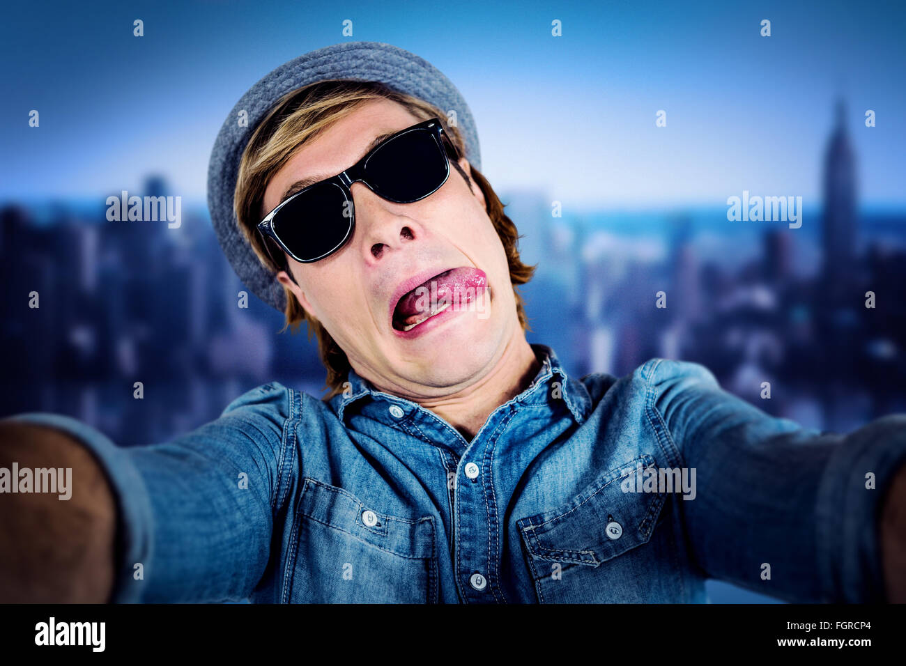 Composite image of crazy hipster wearing sunglasses Stock Photo