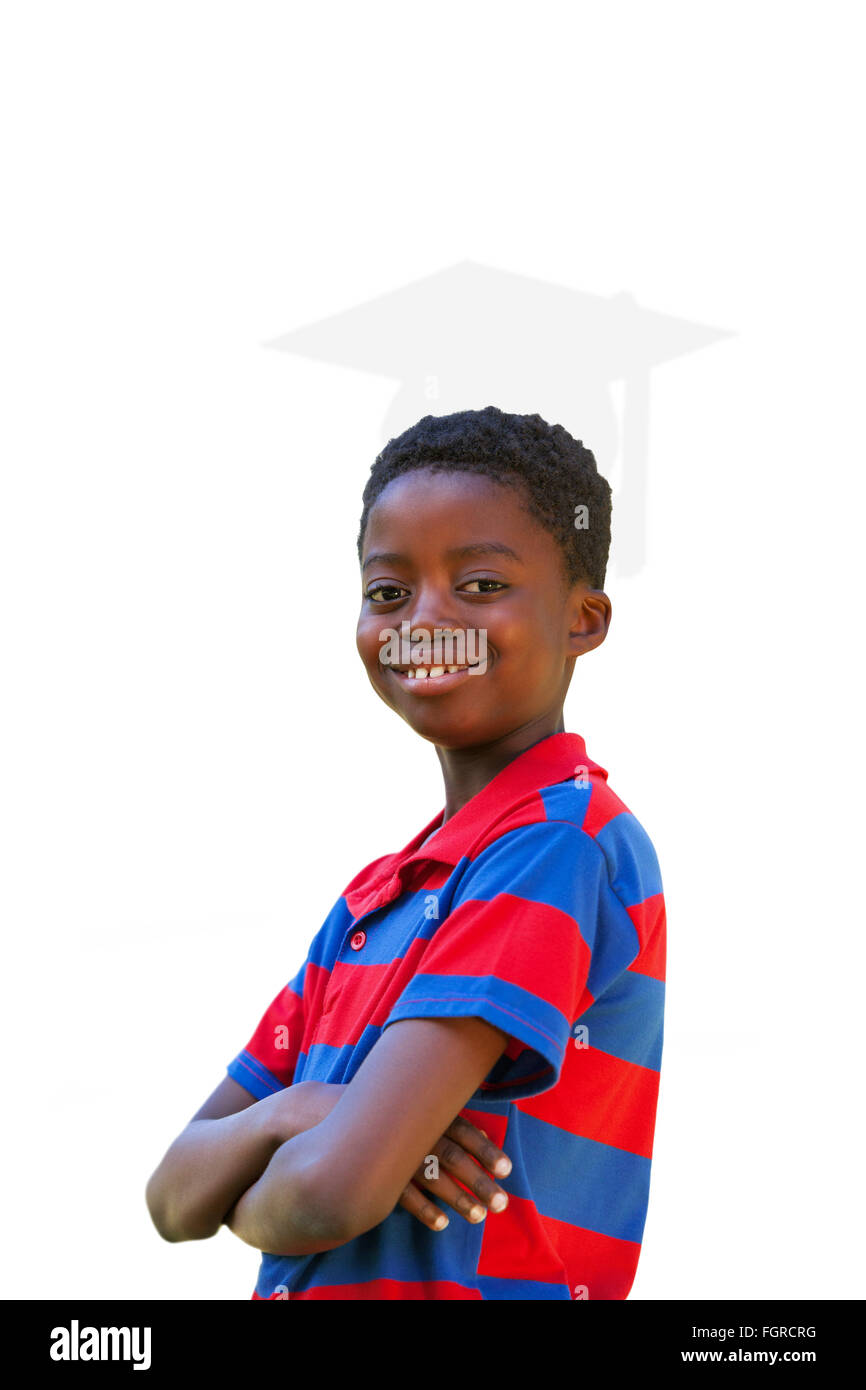 Composite image of cute little boy smiling at camera Stock Photo - Alamy