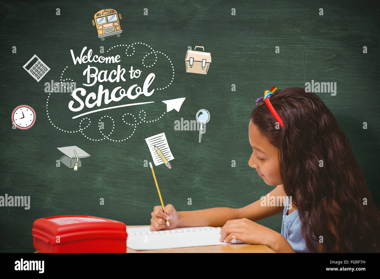 Composite image of pupil at her desk Stock Photo - Alamy