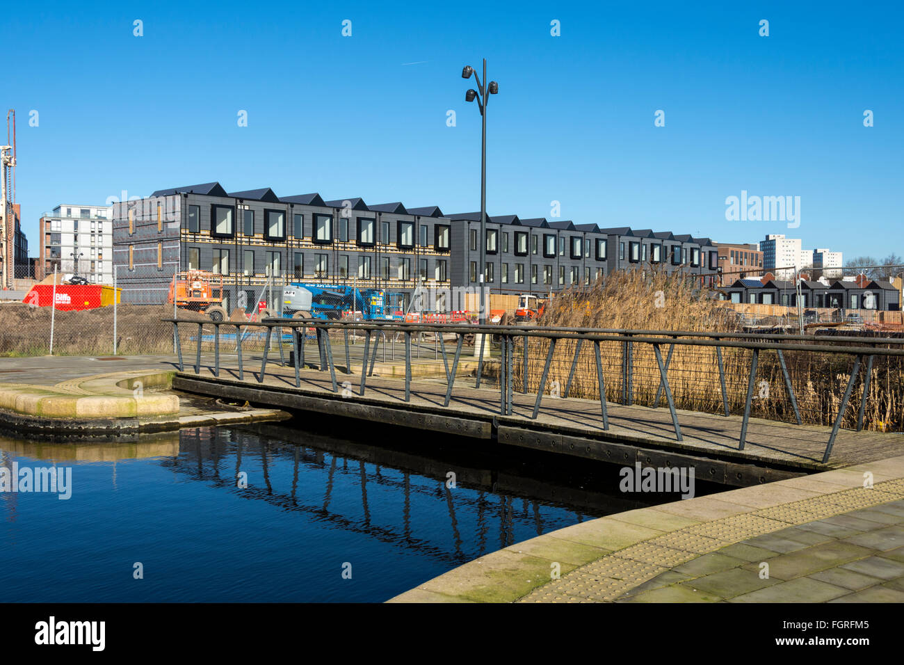 The hoUSe development of prefabricated homes under construction, from ...