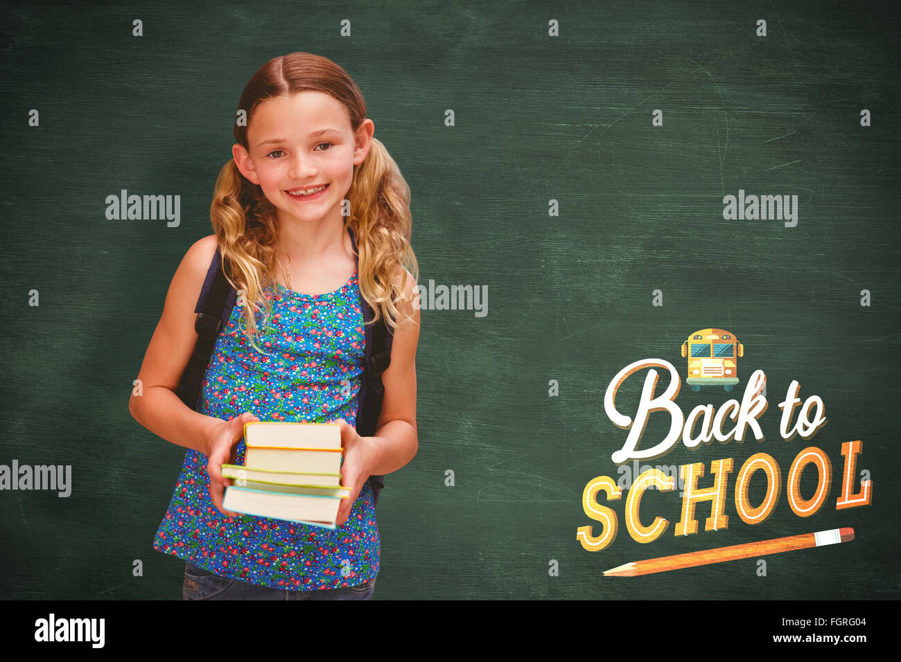 Composite image of cute little girl holding books in library Stock ...