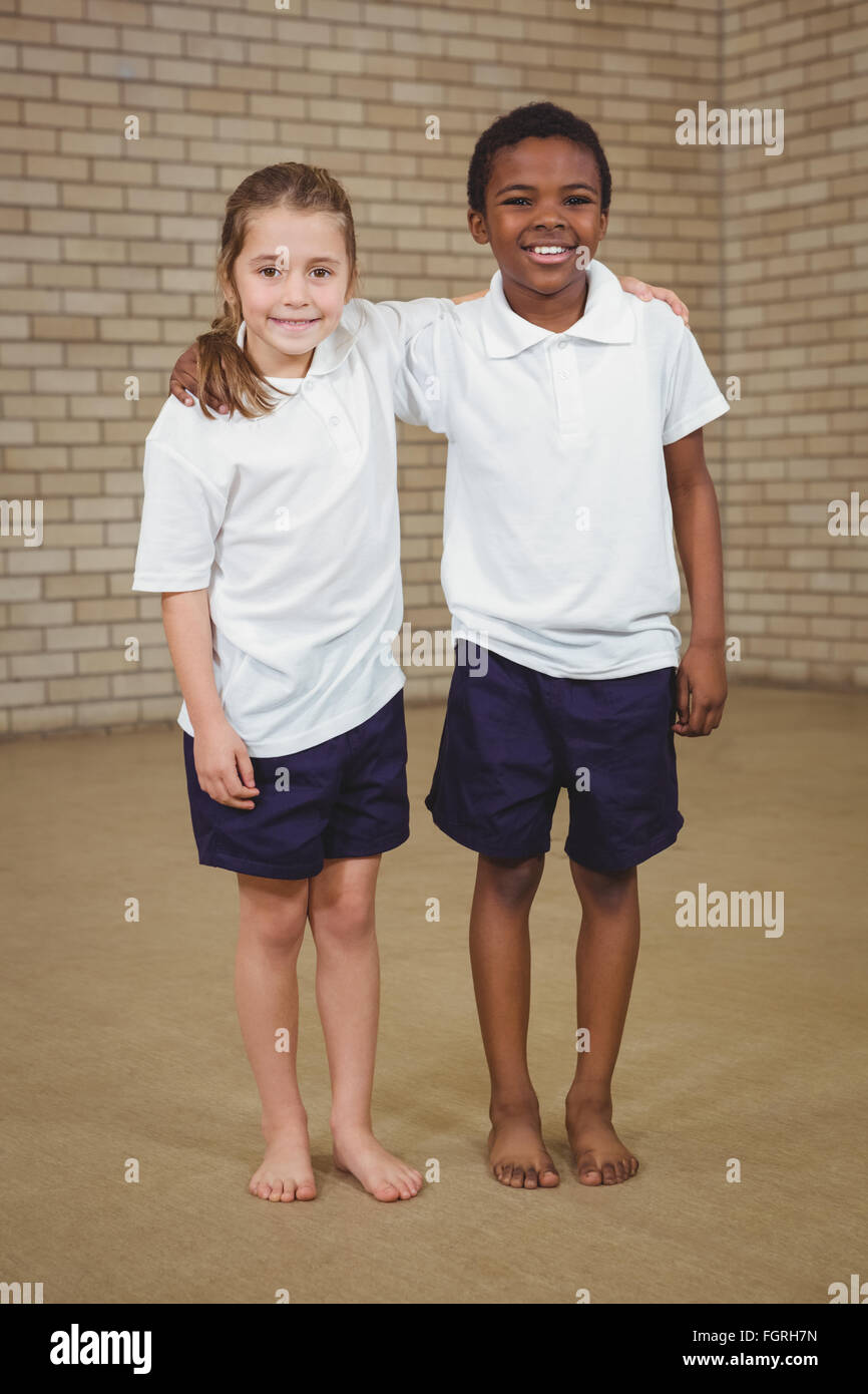 Boy girl arms around other hi-res stock photography and images - Alamy