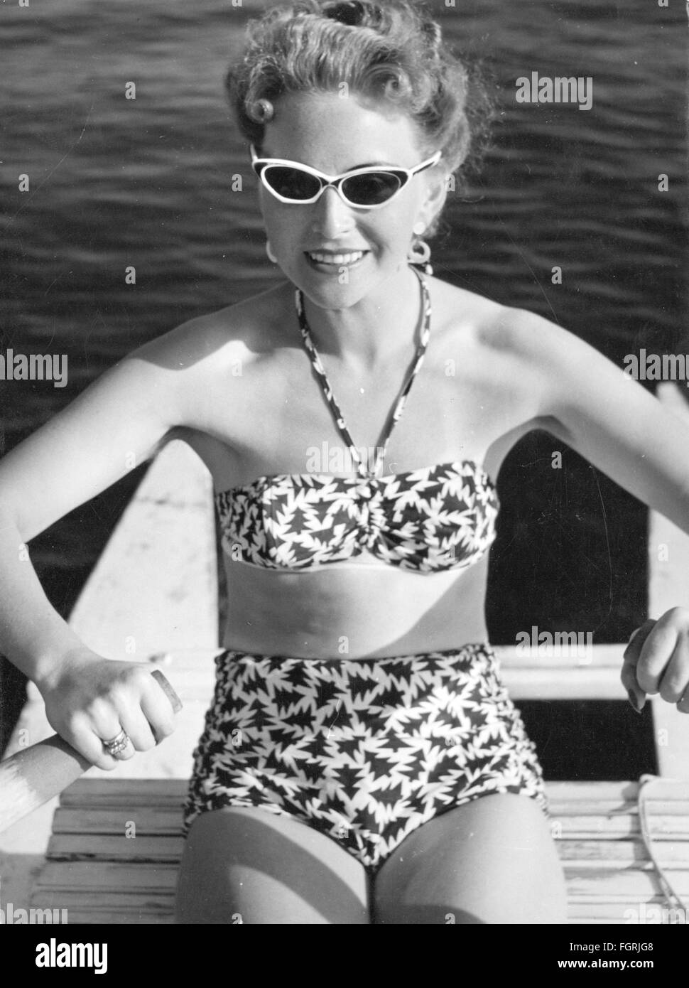 fashion, 1950s, beach fashion, mannequin in bikini and with sunglasses on rowboat, 1950s, Additional-Rights-Clearences-Not Available Stock Photo