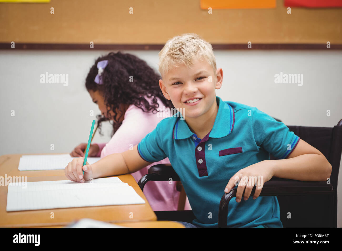 Wheelchair student in classroom hi-res stock photography and images - Alamy