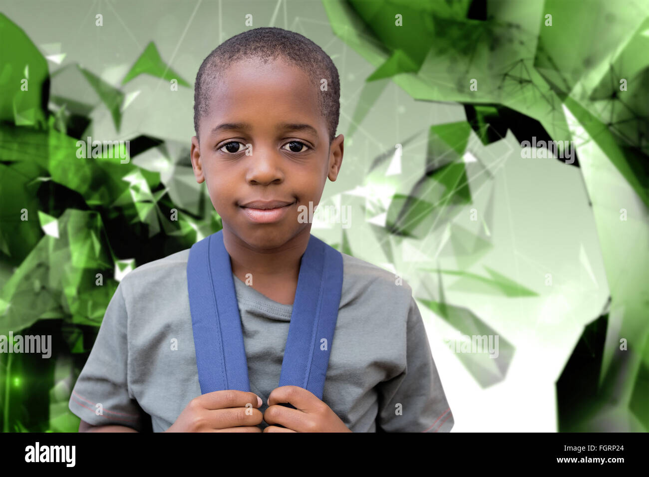 Composite image of cute pupil smiling at camera Stock Photo - Alamy