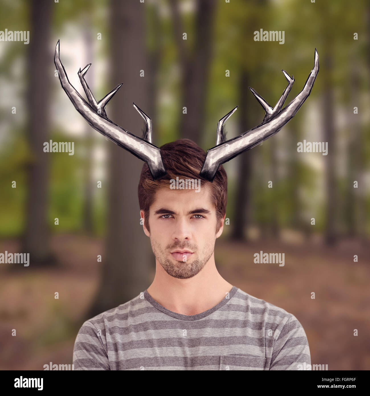 Composite image of portrait of confident businessman with arms crossed Stock Photo