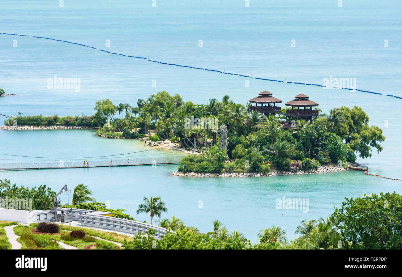 Suspension bridge Islet off Palawan Beach with two Lookout Towers overlooking the Singapore Strait, Sentosa Island, Singapore Stock Photo