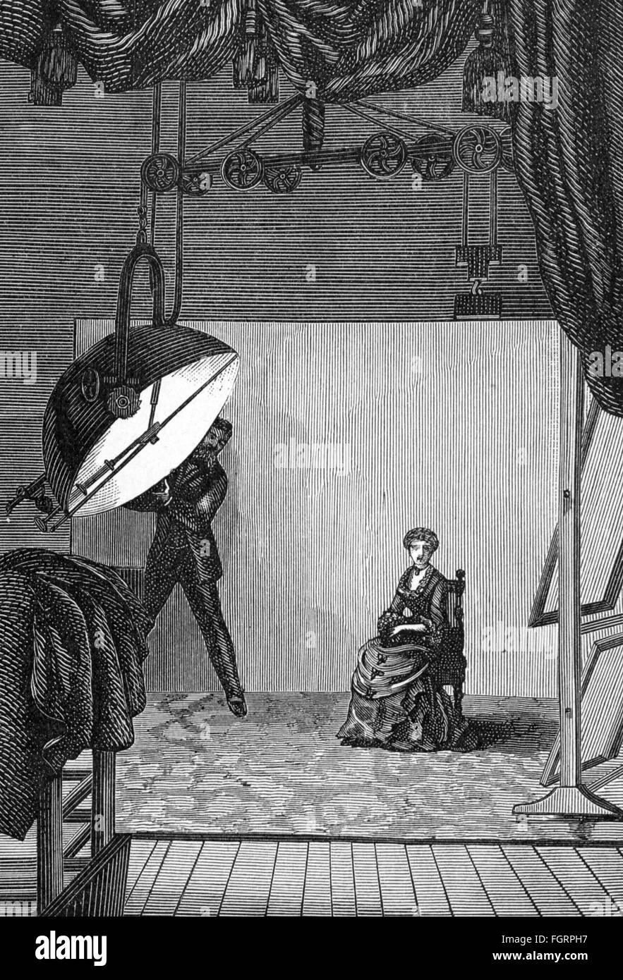 photography,studios,photographing under electrical light,wood engraving,19th century,19th century,graphic,graphics,photographer's studio,photographer's salon,photographic studio,lights,lightness,illumination,illuminations,electricity,electrical,electric,background,backgrounds,photographer,photographers,standing,sitting,sit,photo camera,camera,cameras,lamp,lamps,luminary,luminaries,illuminants,illuminant,source of light,sources of light,studio,atelier,artist's workroom,ateliers,artist's workrooms,studios,photograph,phot,Additional-Rights-Clearences-Not Available Stock Photo