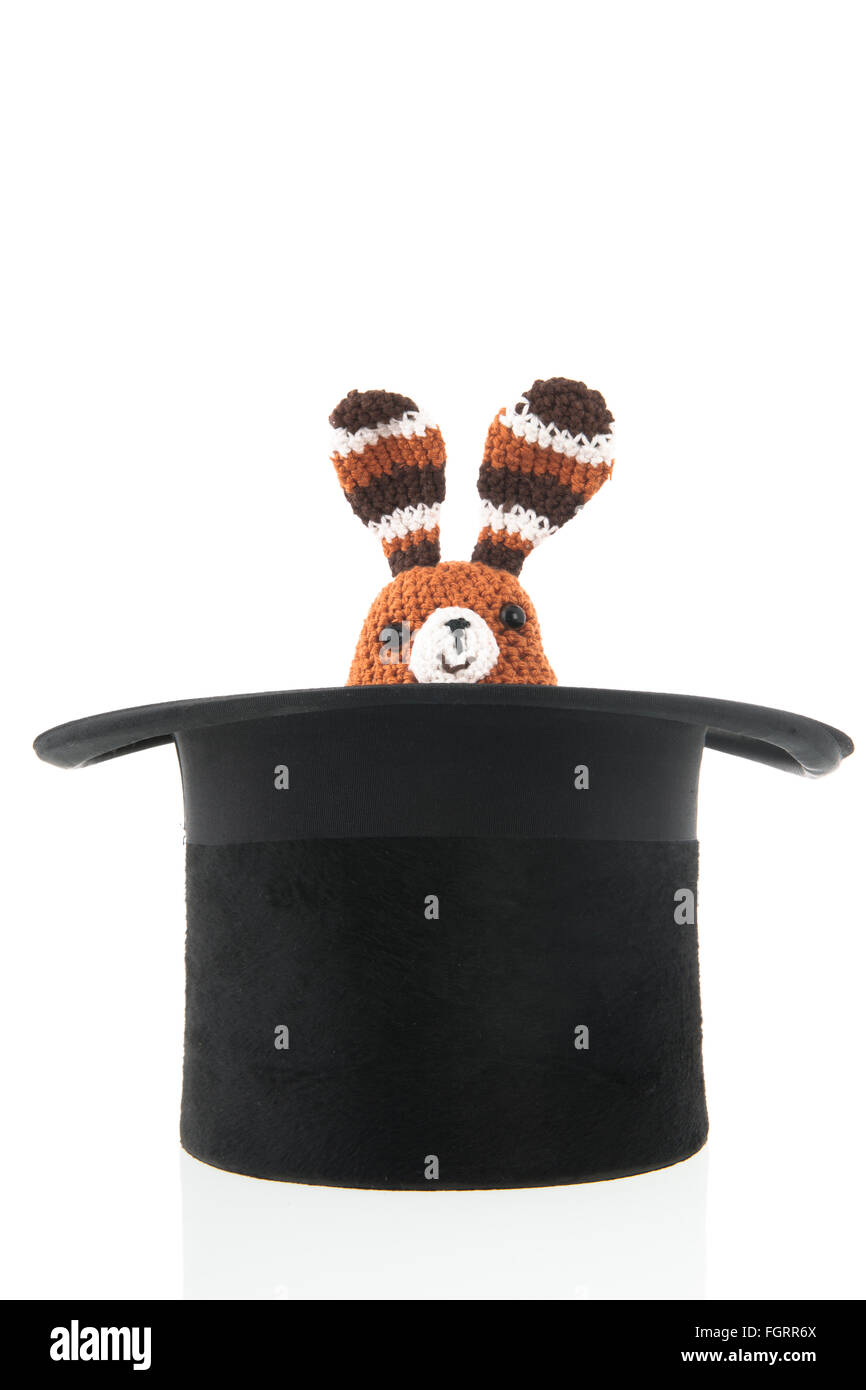 Hand made funny little stuffed toy rabbit in black hat Stock Photo Alamy