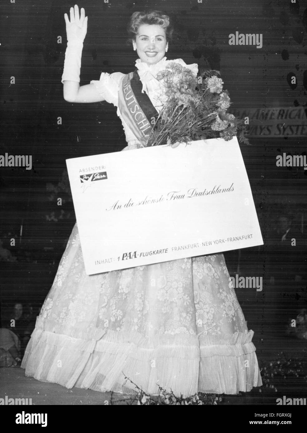 people,women,beauty pageants,Miss Germany 1952,winner Renate Hoy,full length,Kurhaus,Baden-Baden,10.5.1952,20th century,1950s,50s,Germany,Baden - Baden,beauty contest,beauty contests,beauty queen,beauty queens,beauty,beauties,belle,belles,sitting,sit,clothes,outfit,outfits,evening dress,evening dresses,evening gown,sash,sashes,smiles,smiling,smile,birth name: Anita Huy,actress,flower,flower bouquet,bunch of flowers,bouquets,evening gloves,evening glove,opera gloves,opera glove,waving,beckon,beckoning,honor,honour,Additional-Rights-Clearences-Not Available Stock Photo