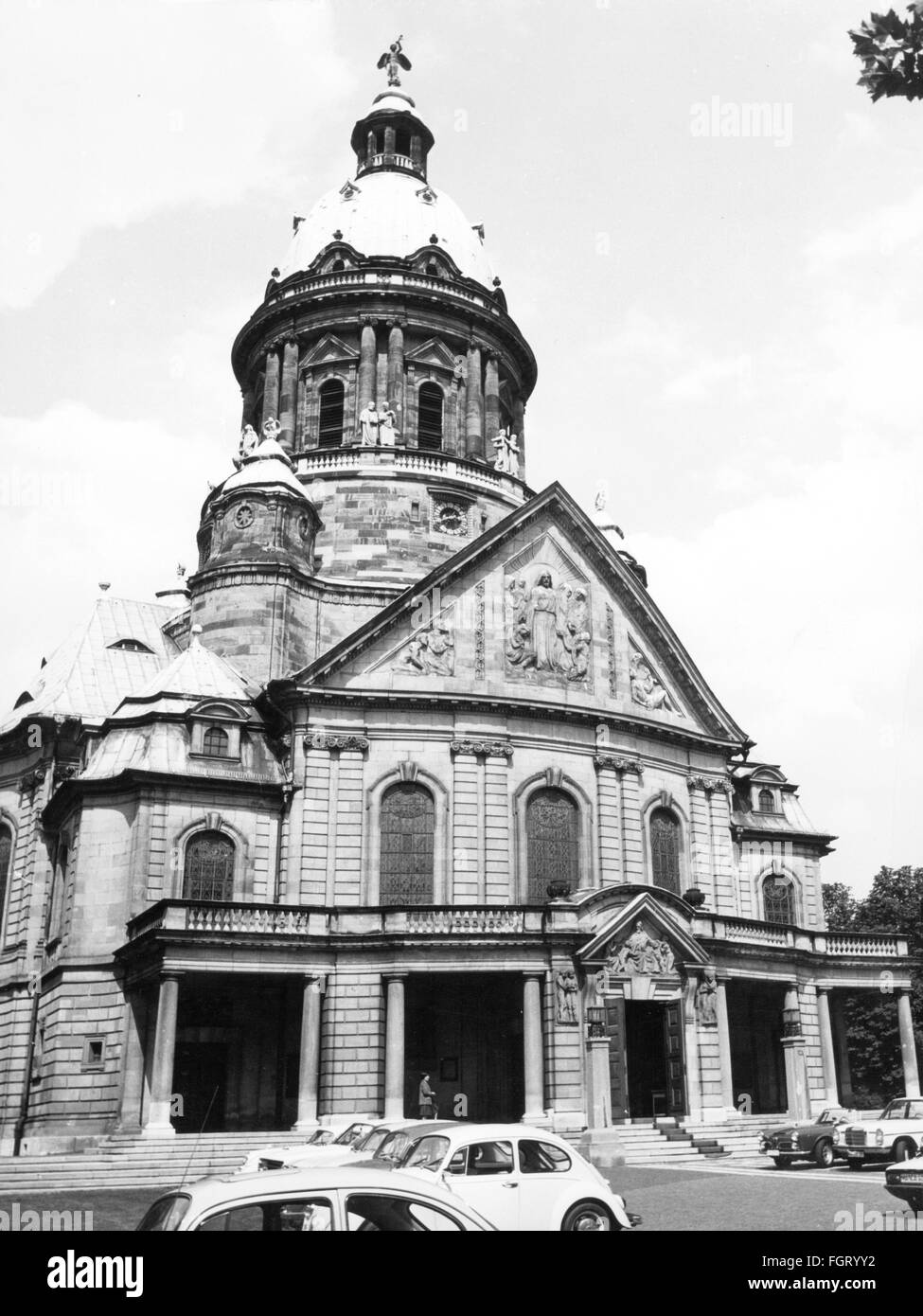 geography / travel,Germany,Baden-Wuerttemberg,Mannheim,churches,Christ Church,built by Christian Schrade,1907 - 1911,exterior view,circa 1970,20th century,1960s,60s,1970s,70s,religion,religions,Christianity,facade,facades,portal,portals,gable,gables,pediments,dome,domes,steeple,church tower,steeples,church towers,Art Nouveau,Jugendstil,neo-baroque,parking spot,parking spaces,parking spots,parkings,in a parking space,find a place park,car,cars,VW beetle,Southern Germany,the South of Germany,Germany,Central Europe,Eu,Additional-Rights-Clearences-Not Available Stock Photo