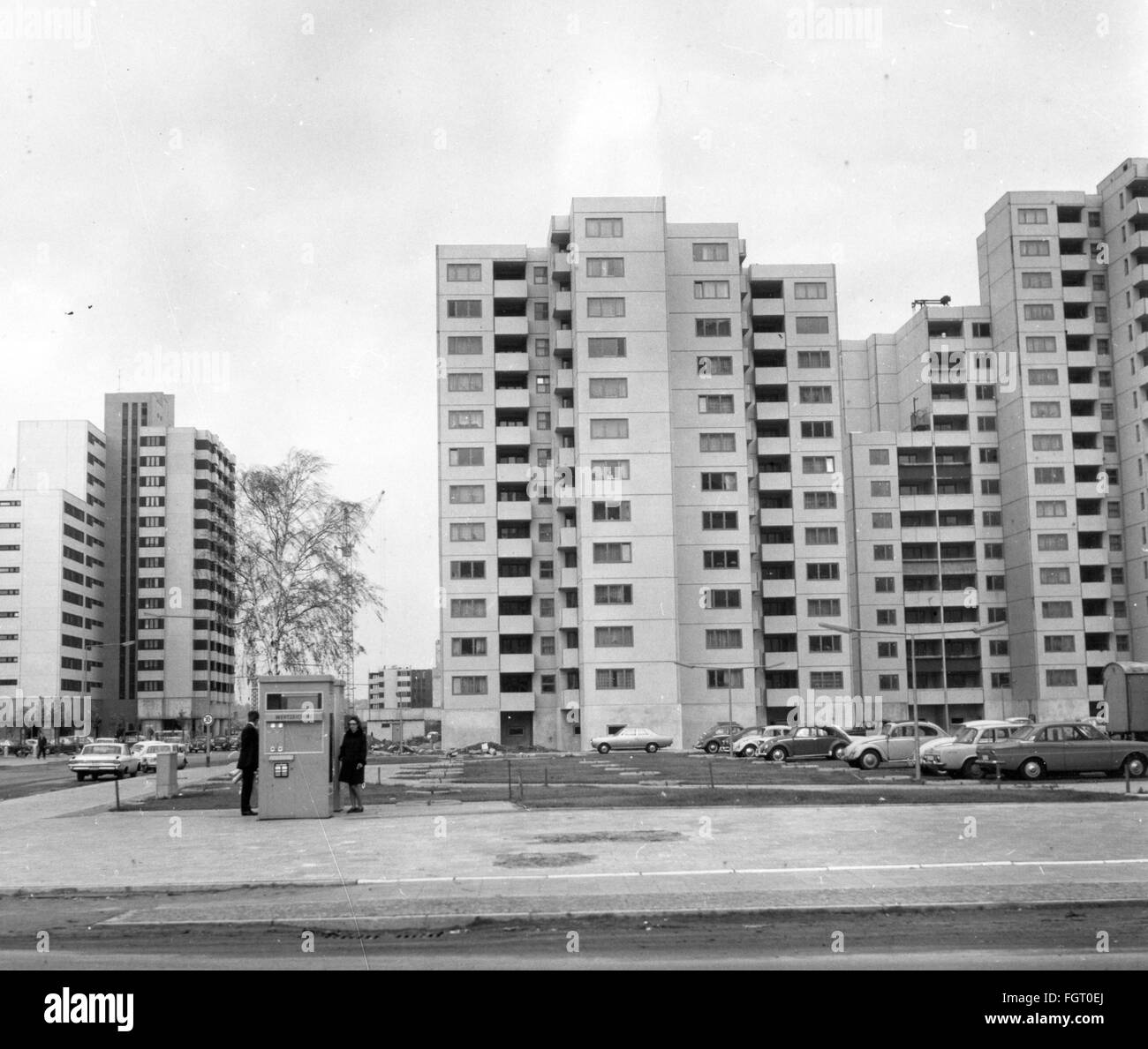 geography / travel,Germany,Berlin,district,Maerkisches Viertel,dwellings,built between 1966 and 1968,exterior view,1969,architecture,development area,housing estate,new house,new building,new houses,new buildings,multi-storey building,high-rise building,buildings,house,houses,large residential subdivision,satellite town,satellite towns,people,cars,car,Volkswagen,VW beetle,Reinickendorf,West Berlin,Central Europe,1960s,60s,20th century,district,districts,home,dwelling,homes,dwellings,historic,historical,Maerkisches,Mär,Additional-Rights-Clearences-Not Available Stock Photo
