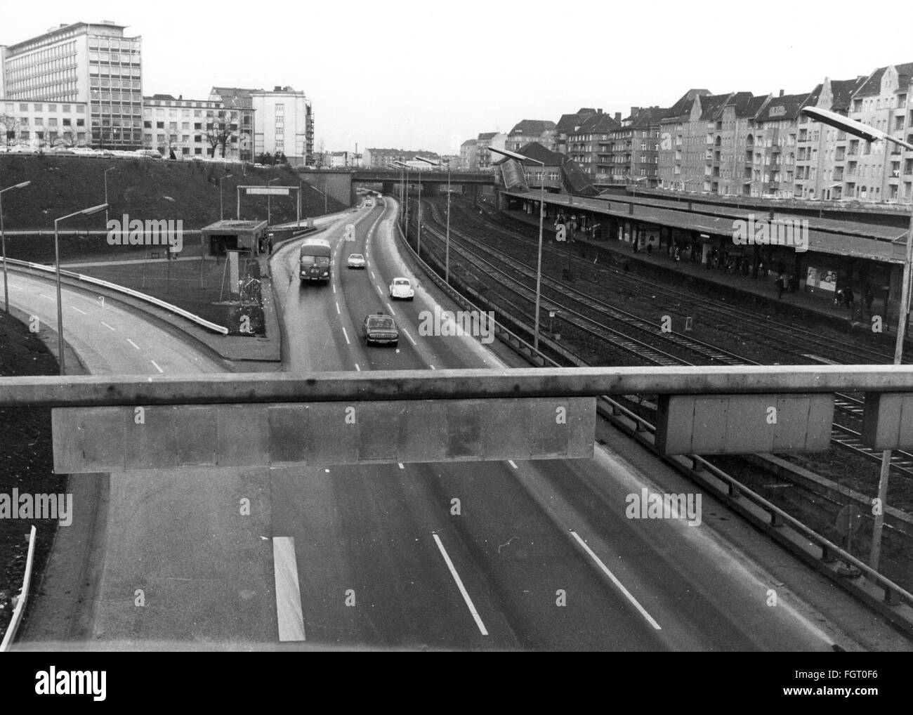 geography / travel, Germany, Berlin, transport / transportation, streets, urban motorway at railway station Messe Nord, 1971, city ring road, Autobahn, federal motorway B100, B 100, transport, transportation, road traffic, cars, car, Volkswagen, VW beetle, railroad, railways, railroads, suburban railway, suburban train, city train, house, multi-storey building, high-rise building, buildings, houses, Charlottenburg, West Berlin, 1970s, 70s, 20th century, people, streets, street, urban motorway, urban motorways, historic, historical, Additional-Rights-Clearences-Not Available Stock Photo