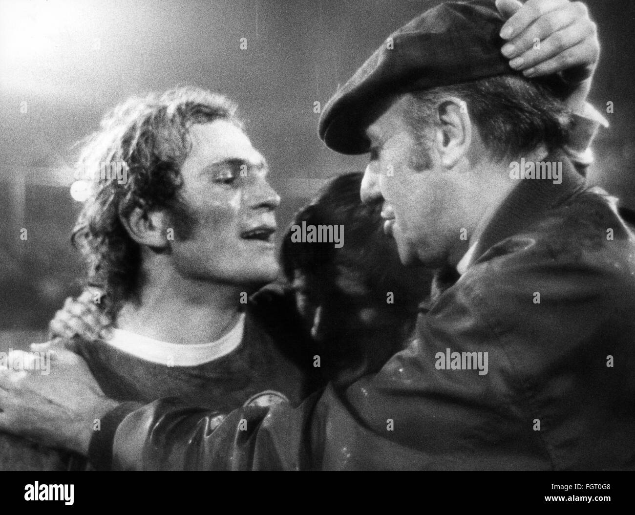 sports,football,European championship 1972,qualification,quarter final,game England against Federal Republic of Germany,Wembley stadium,London,29.4.1972,coach of the national team Helmut Schoen huging striker Uli Hoeness after the 1: 3 victory,football match,soccer match,football matches,footballer,footballers,kicker,football player,football players,player,players,trainer,coach,trainers,coaches,winner,winners,Wembley,sweat,sweating,athlete,athletes,West Germany,Western Germany,Great Britain,1970s,70s,20th century,people,men,Additional-Rights-Clearences-Not Available Stock Photo