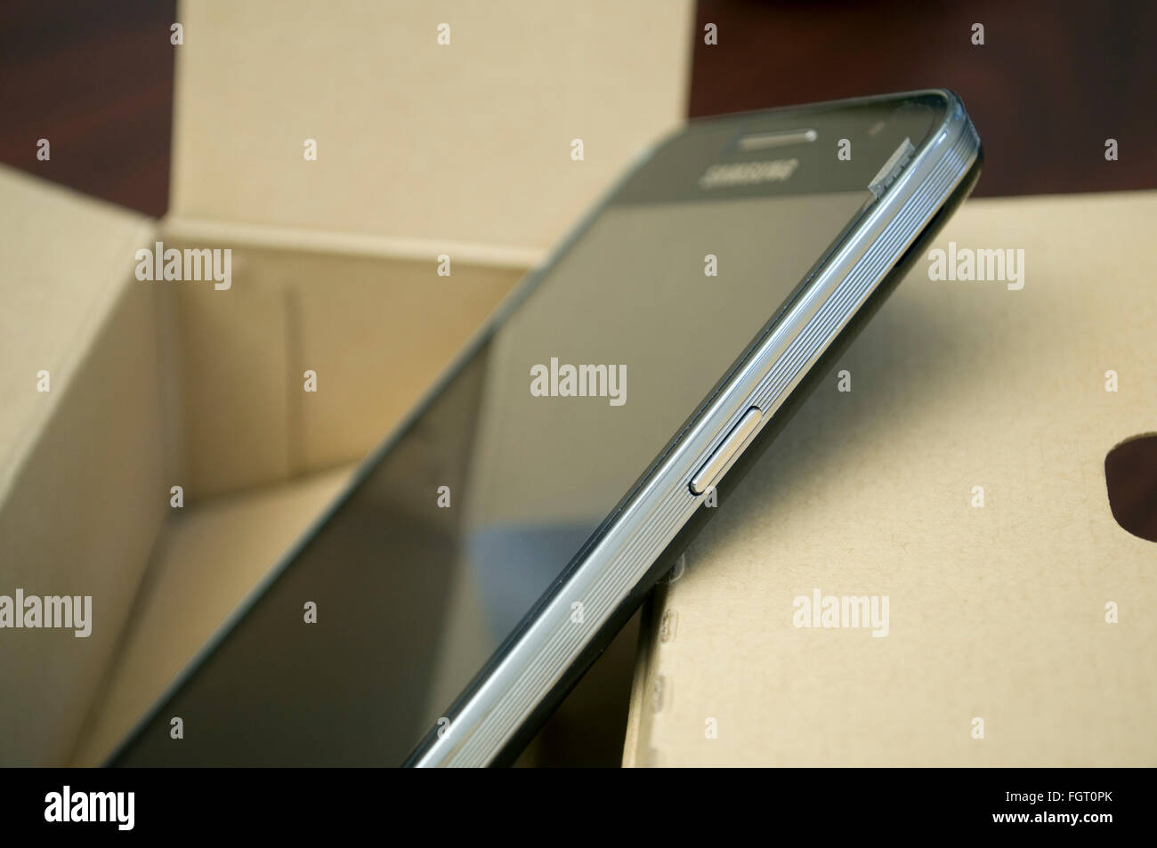 Smartphone in the box Stock Photo - Alamy