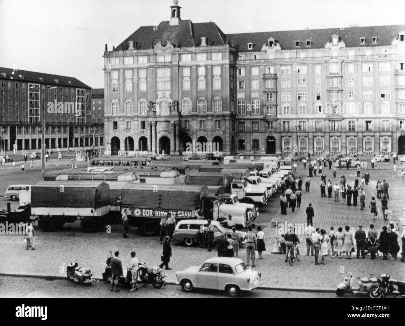 disasters,earthquakes,Skopje,Yugoslavia,26.7.1963,relief supply of the Red Cross,lorries with relief supplies on the main square of Dresden,Germany,August 1963,Macedonia,relief supplies,International Red Cross,German Red Cross,American Red Cross,British Red Cross Society,relief,aid,meeting place,assembly point,convoys,under convoy,in convoy,supply,resupply,East-Germany,GDR,DDR,East Germany,Eastern Germany,Saxony,1960s,60s,20th century,crowd,crowds,crowds of people,disaster,disasters,earthquake,temblor,seism,shake,lorrie,Additional-Rights-Clearences-Not Available Stock Photo