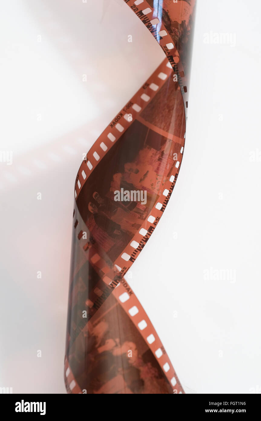 curled 35mm film strip Stock Photo