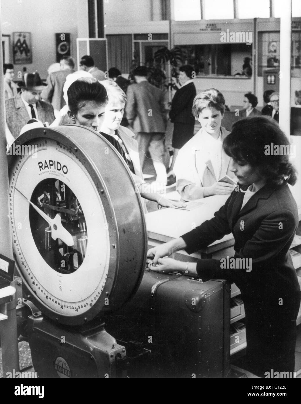 transport / transportation, aviation, airport, Germany, Berlin-Schoenefeld Airport, airport terminal, interior view, departure lounge, counter of the airline Interflug, East Berlin, September 1963, Additional-Rights-Clearences-Not Available Stock Photo