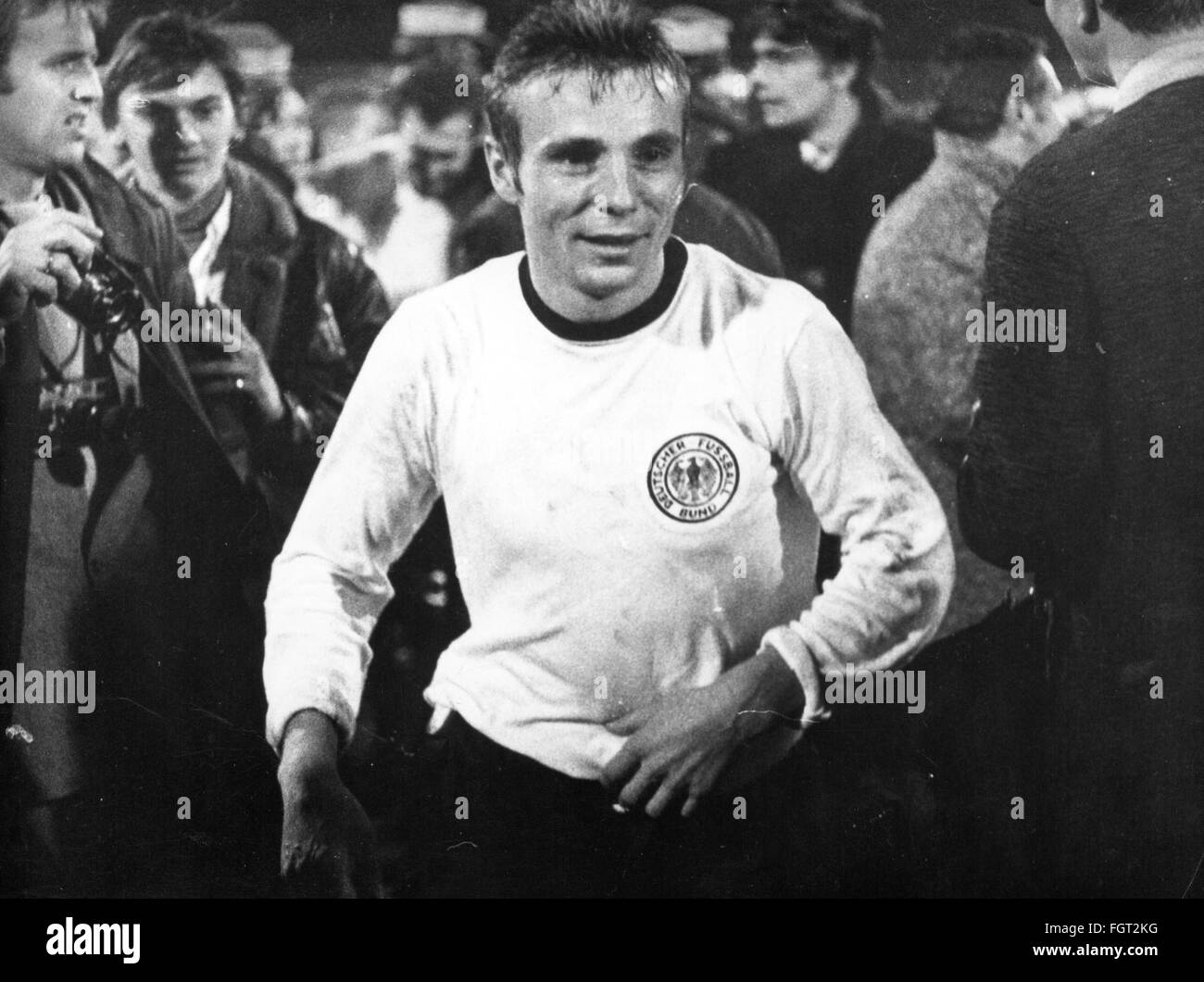 sports,football,match,international match,qualification match for the world championship 1970,Germany against Scotland,German player Reinhard Libuda after the victory,Volksparkstadion,Hamburg,22.10.1969,winner,winners,cheers,jubilation,jubilance,jubilate,jubilating,cheer,cheering,frenetic,joy,happiness,happy,exhausted,mental exhaustion,fan,fanboy,fans,fanboys,German national team,qualification,qualifications,Football World Cup,Soccer World Cup,World Football Championship,soccer world championship,FIFA World Cup,football matc,Additional-Rights-Clearences-Not Available Stock Photo