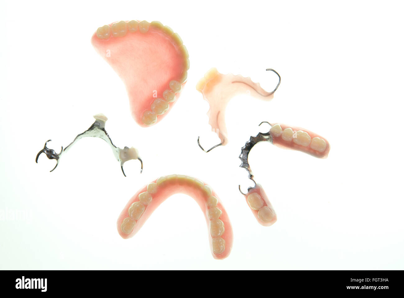 set of dentures on white background Stock Photo - Alamy