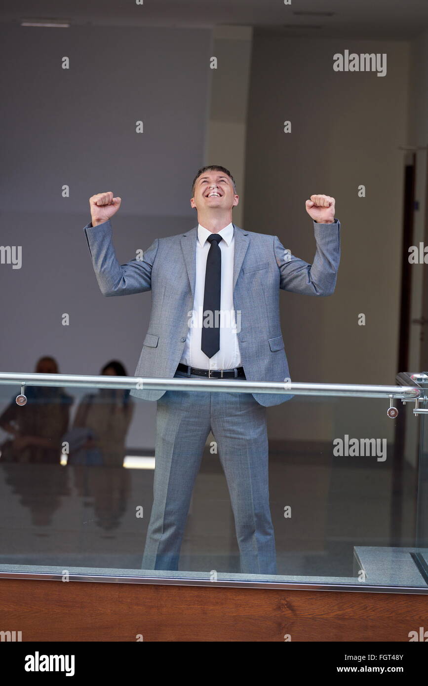 Excited man rising hands up hi-res stock photography and images - Alamy